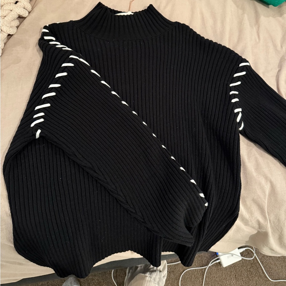 Black Ribbed Sweater with White Stitching